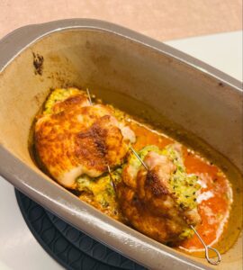 Gefüllte Hendlhaxerl oder Brust